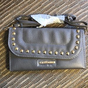 Rampage cross body wallet in gray.